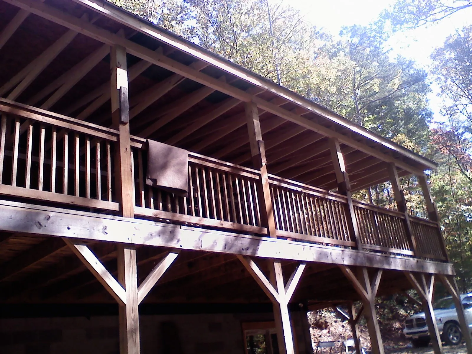 Timber framing under a new elevated porch and deck — Roof Leak Repair in Galena by Roofing Brothers